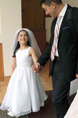 First communion photo of dad and daughter.
